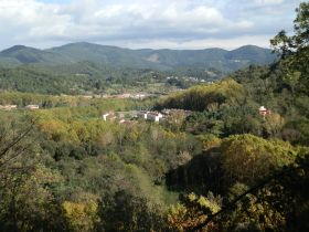 Autumn view of woods and hills near Arbucies