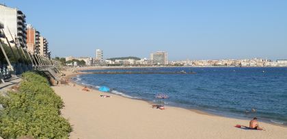 Beach at Sant Antoni de Calonge looking around the bay to Palamos