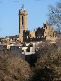 La Bisbal dEmporda church and castle seen from river Daro