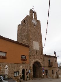 Clocktower and gatehouse at Palau-sator