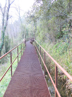 Sant Llorenc de la Muga Walkway over millstream